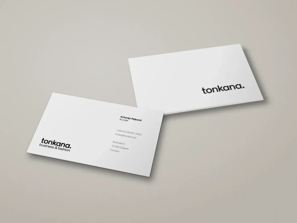 Tonkana business cards in white with a black wordmark